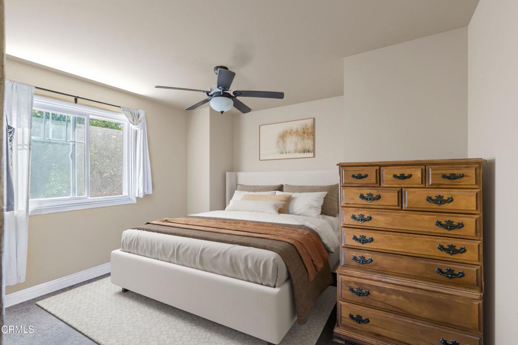 20176 South Mountain Road Santa Paula, CA 93060 - Photo 16 of 43 a bedroom with a bed and a window