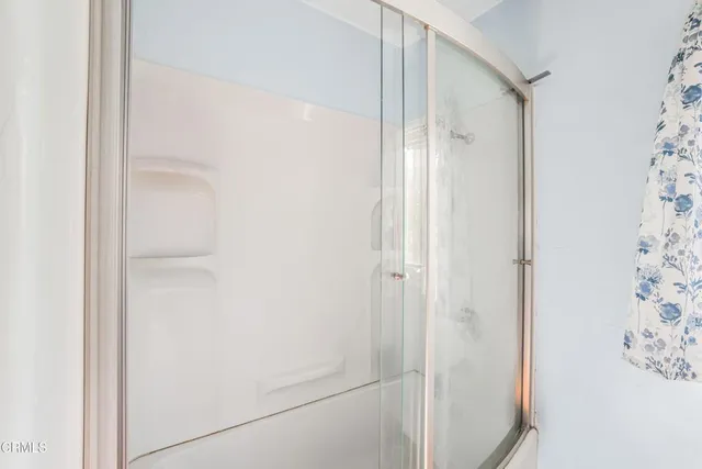 a view of a bike storage and utility room