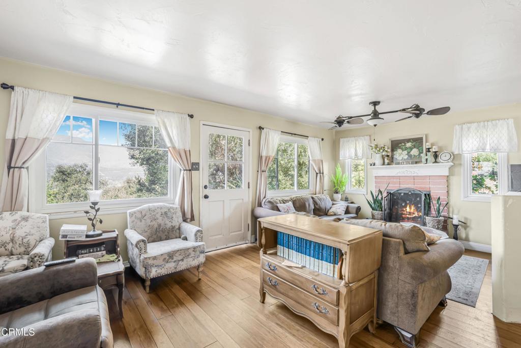 20176 South Mountain Road Santa Paula, CA 93060 - Photo 8 of 43 a living room with furniture and a large window