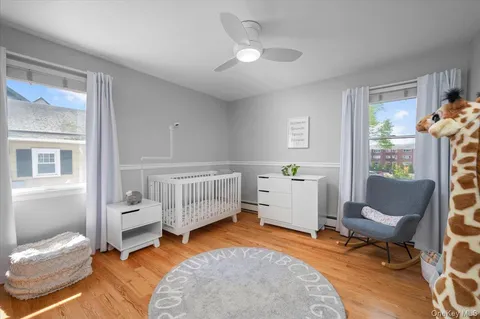 a bedroom with furniture and a window