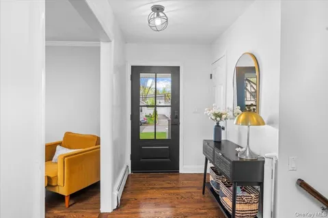 a view of living room with window and couch