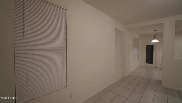 a view of a hallway with closet