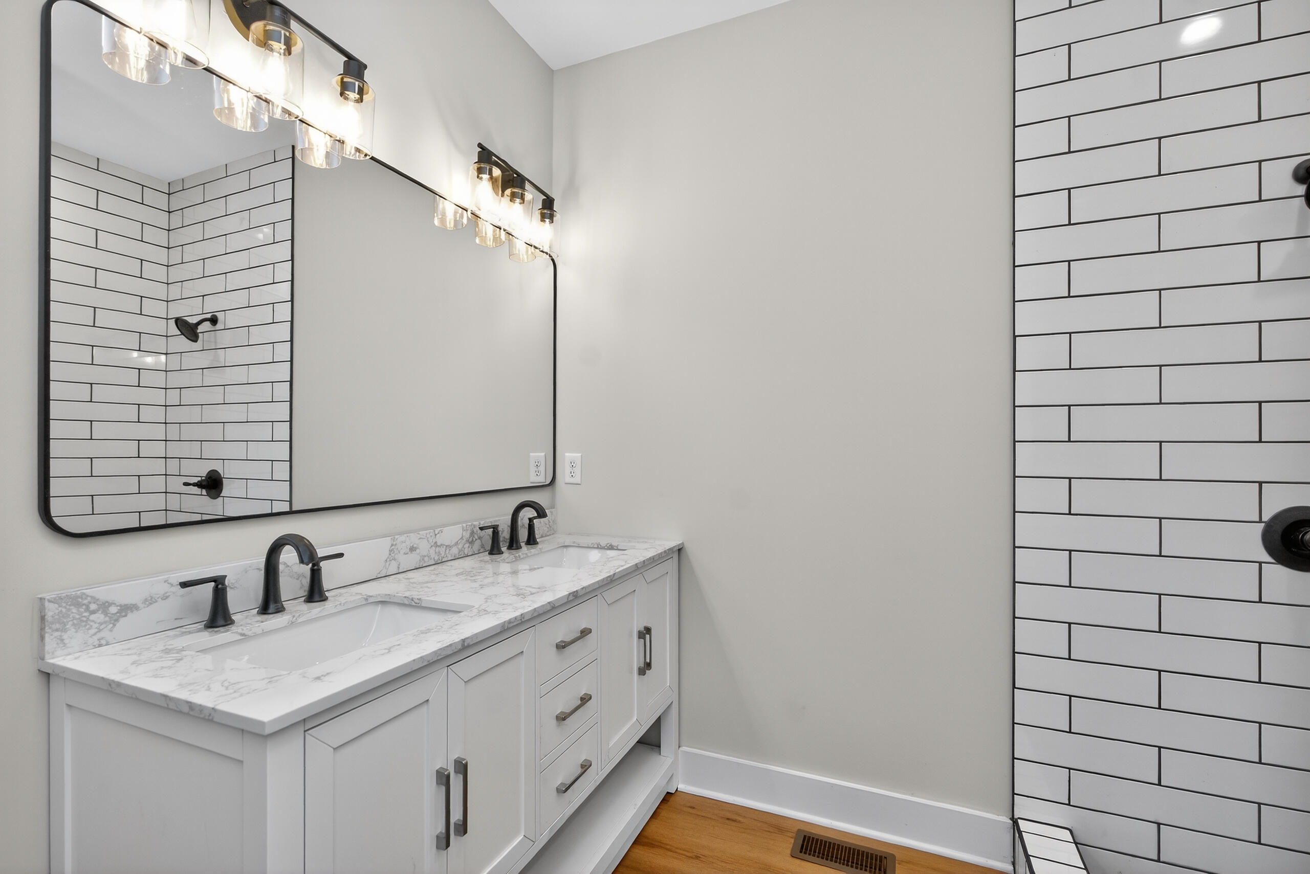 348 Noland Road Richmond, KY 40475 - Photo 13 of 34 Primary bathroom with double sink vanity and custom tile shower