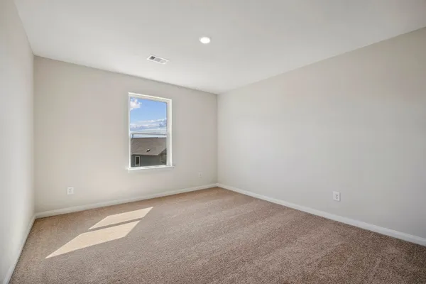 an empty room with a window