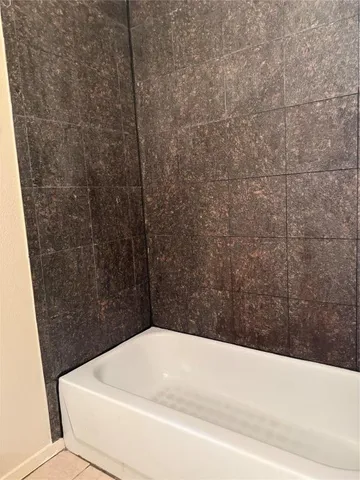 a bathroom with a bathtub