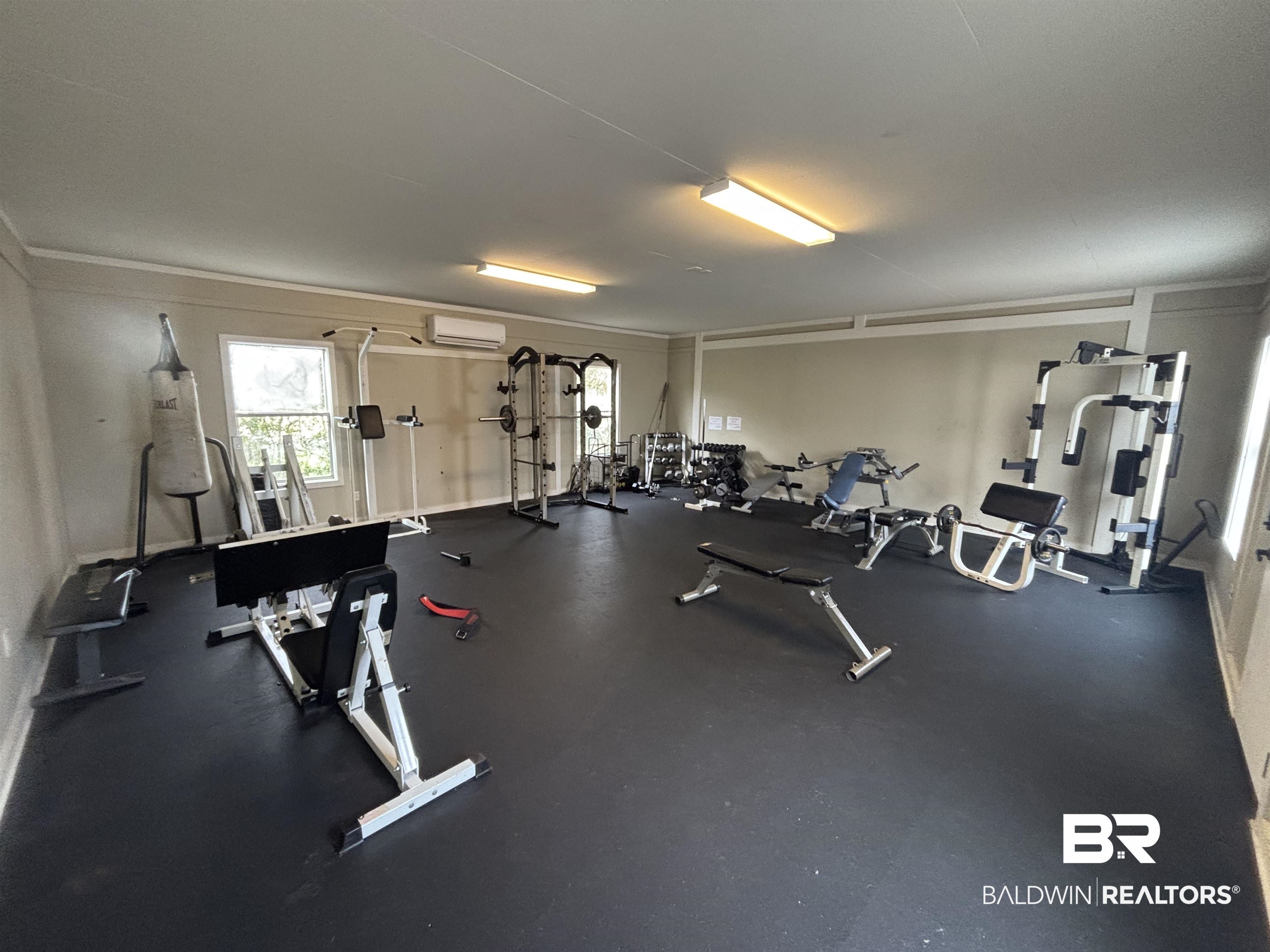 24561 Austin Road Daphne, AL 36526 - Photo 55 of 57 Workout area with a wall mounted air conditioner