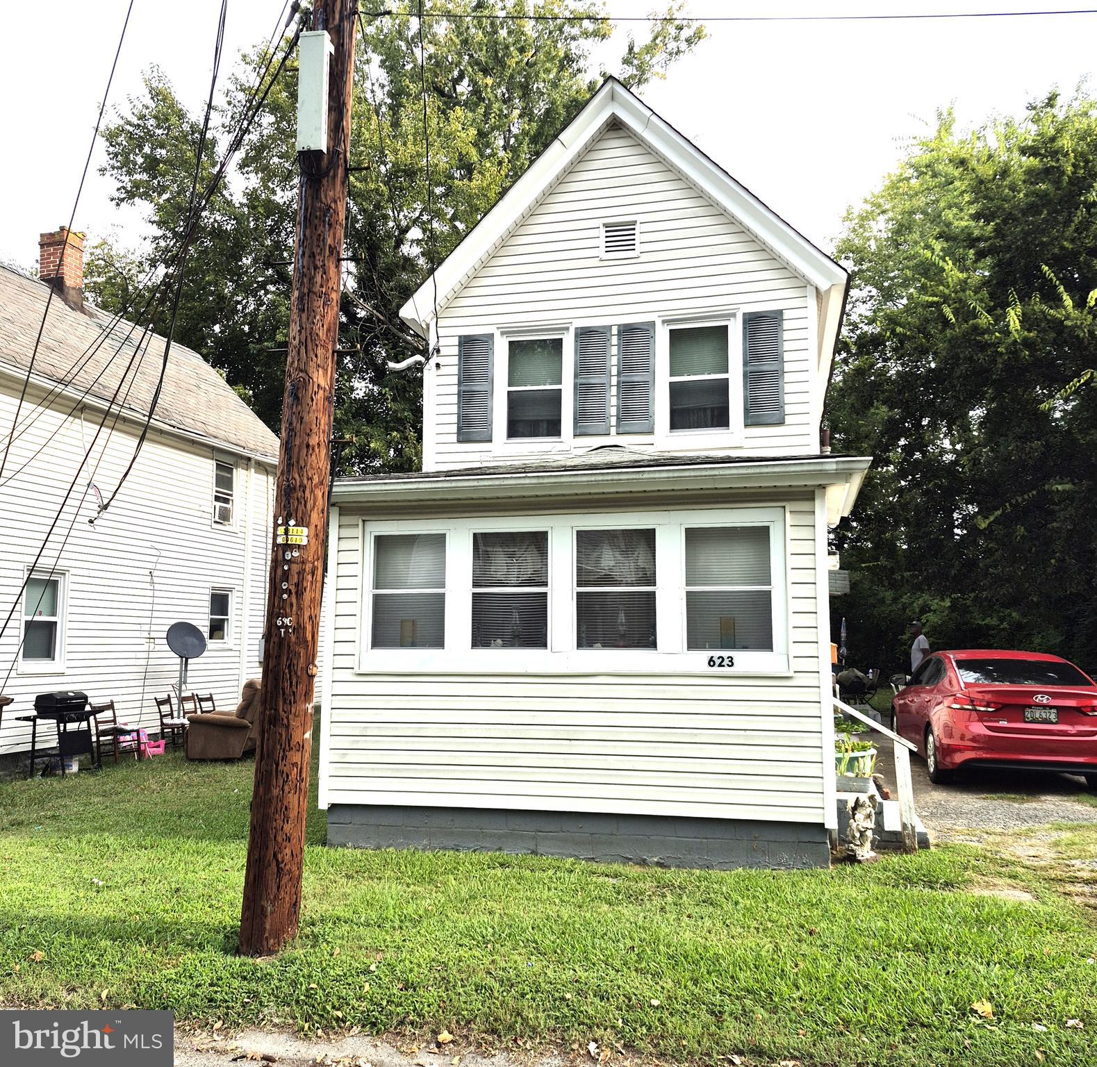 623 Cross Street Cambridge, MD 21613 - Photo 12 of 14 a house view with a garden space