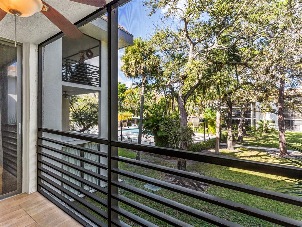 7579 Northwest 79th Avenue, Unit 204 Tamarac, FL 33321 - Photo 31 of 45 a view of a street from a window