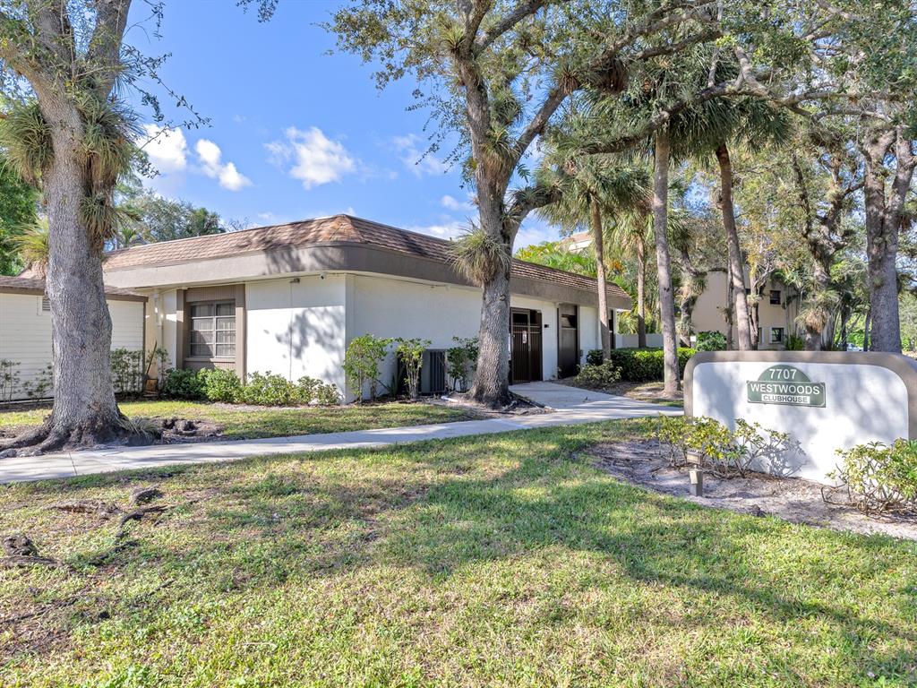 7579 Northwest 79th Avenue, Unit 204 Tamarac, FL 33321 - Photo 36 of 45 a view of a house with a yard