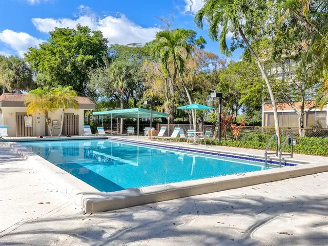 a view of a house with a swimming pool