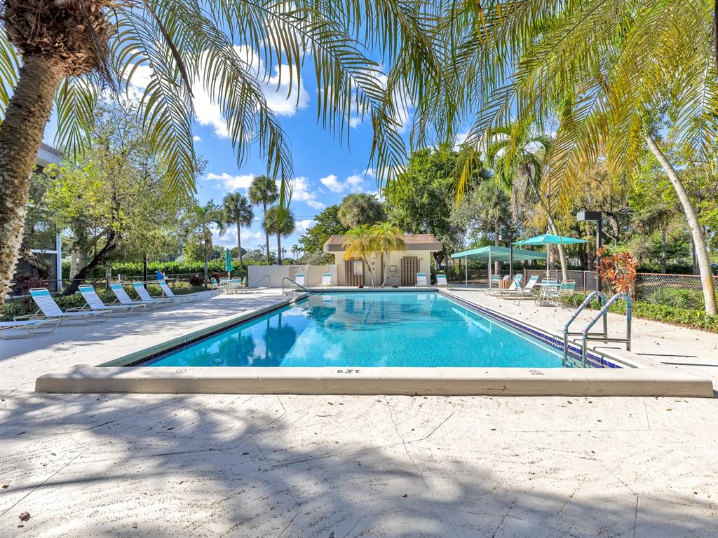 7579 Northwest 79th Avenue, Unit 204 Tamarac, FL 33321 - Photo 38 of 45 a view of a yard