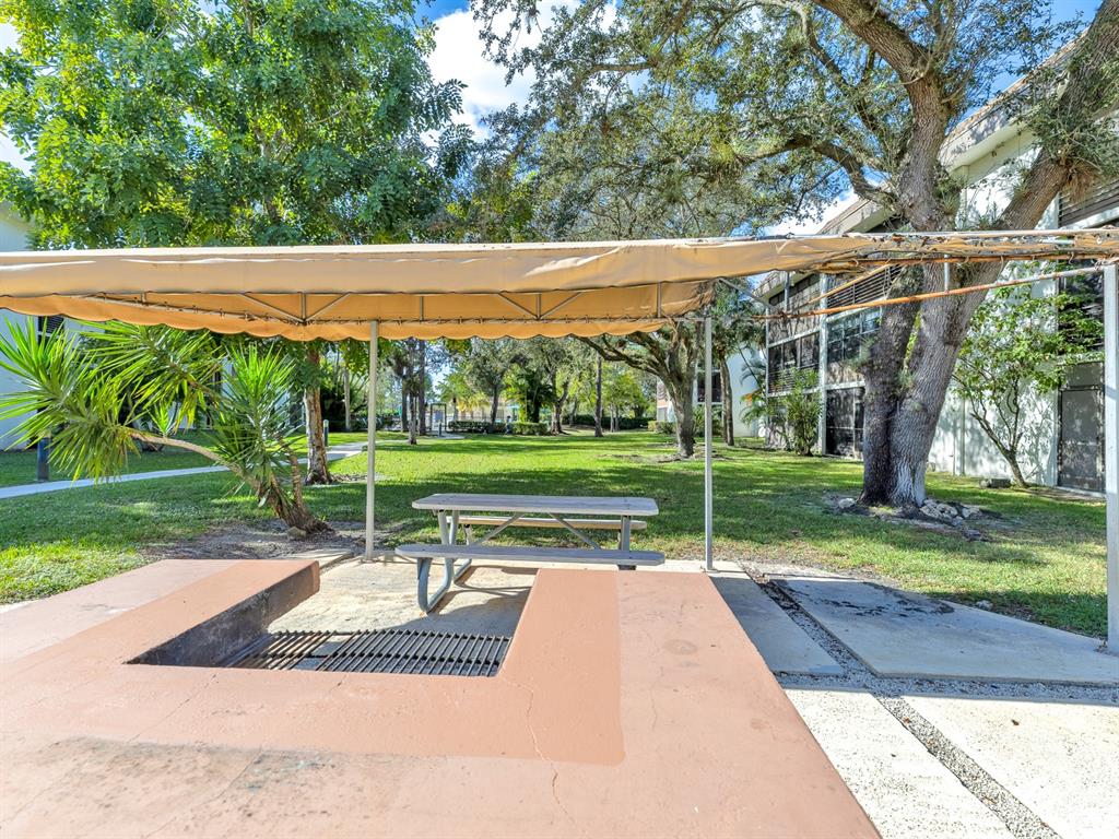 7579 Northwest 79th Avenue, Unit 204 Tamarac, FL 33321 - Photo 40 of 45 a view of a park with slide