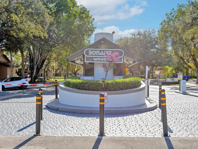 a view of a street with a building in the background