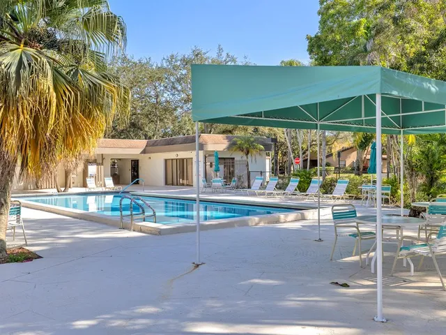 a view of house with outdoor space and porch