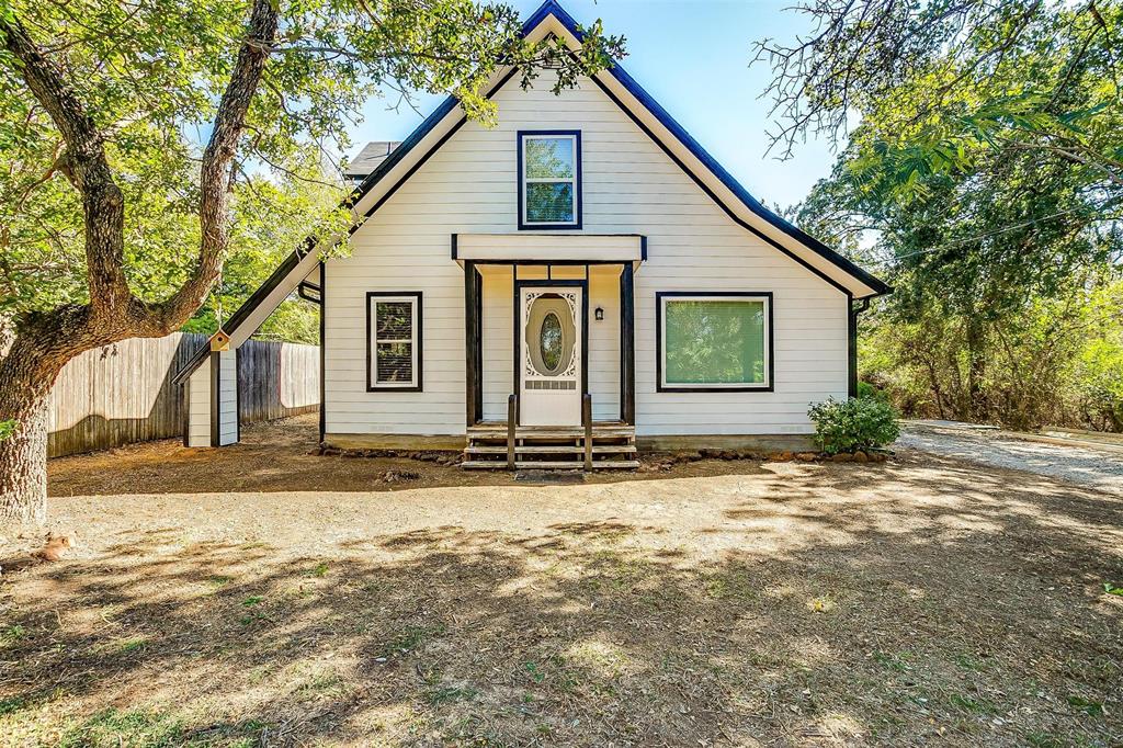 7500 Weatherby Road Burleson, TX 76028 - Photo 1 of 1 a front view of a house with a yard