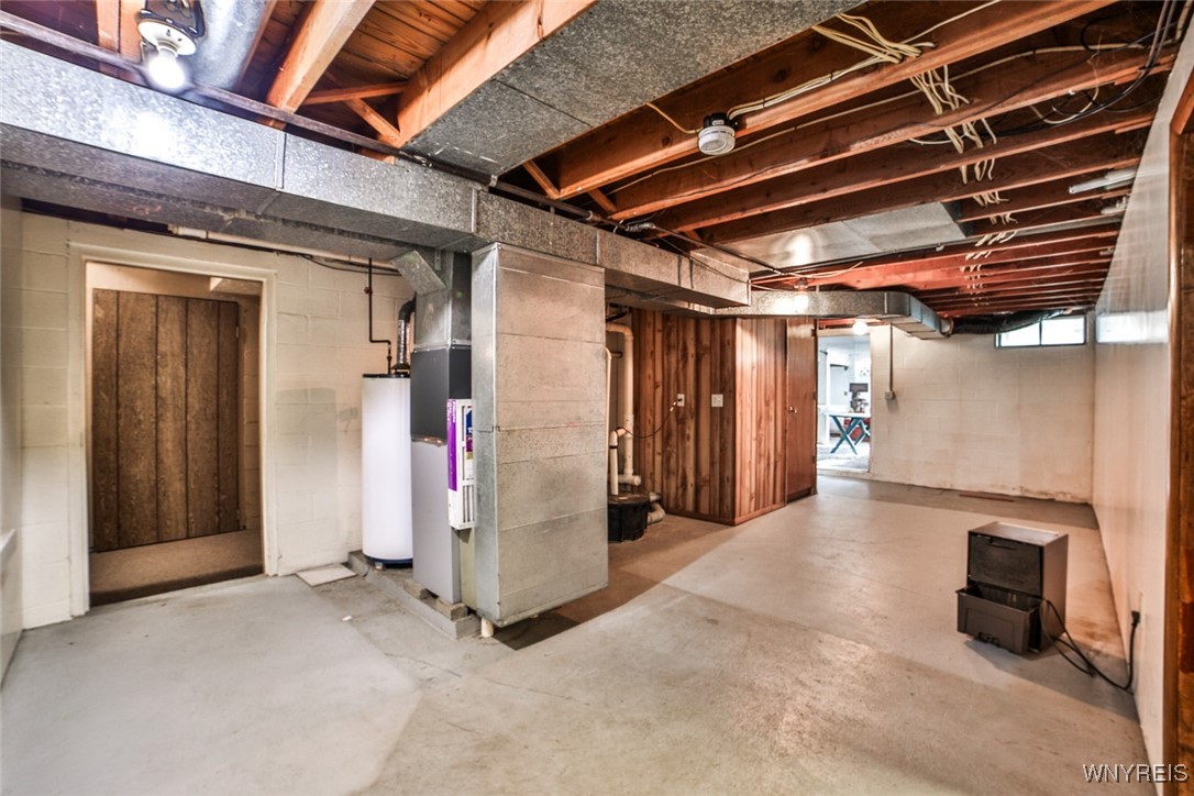 13676 Bloomingdale Road Newstead, NY 14001 - Photo 26 of 39 The door ahead in this basement view leads to the