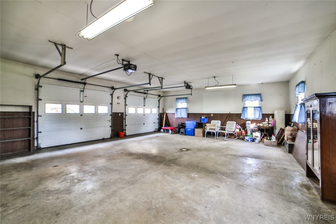 13676 Bloomingdale Road Newstead, NY 14001 - Photo 30 of 39 Oversized attached two car garage with center drai