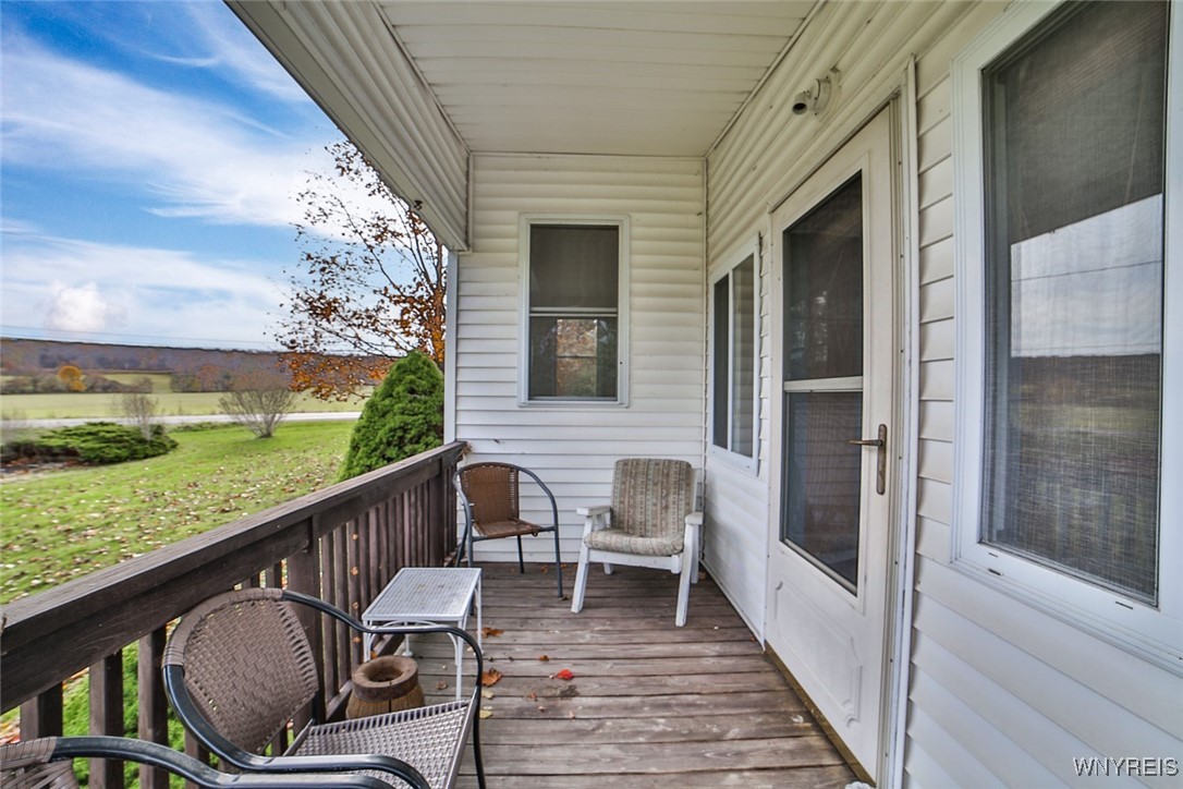 13676 Bloomingdale Road Newstead, NY 14001 - Photo 31 of 39 Charming little covered side porch leading from th