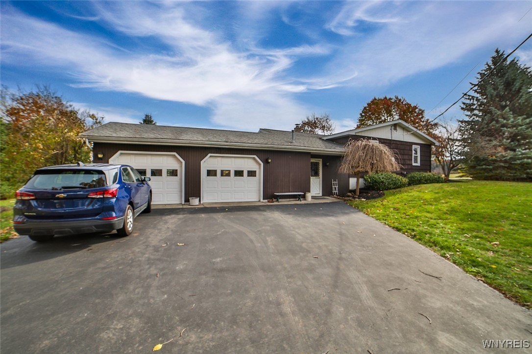 13676 Bloomingdale Road Newstead, NY 14001 - Photo 4 of 39 Oversized attached two car garage and side entrywa