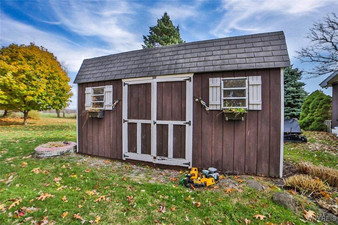 13676 Bloomingdale Road Newstead, NY 14001 - Photo 5 of 39 Added storage space for yard tools and toys in the