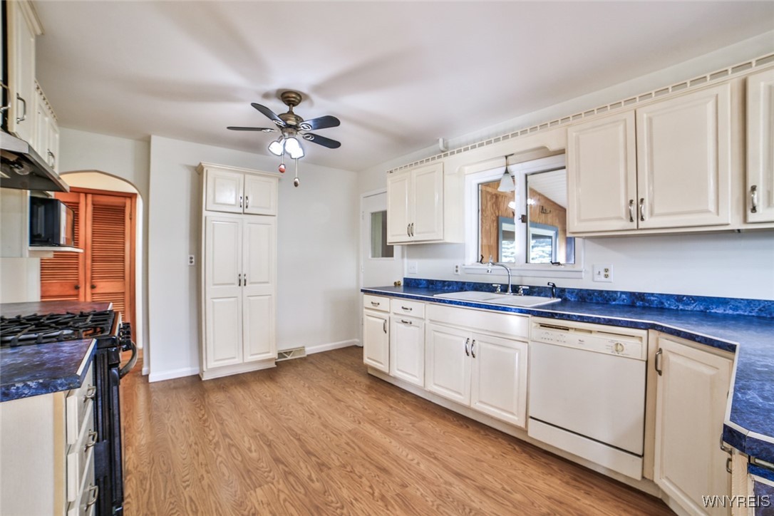 13676 Bloomingdale Road Newstead, NY 14001 - Photo 7 of 39 Bright white kitchen with easy to maintain laminat