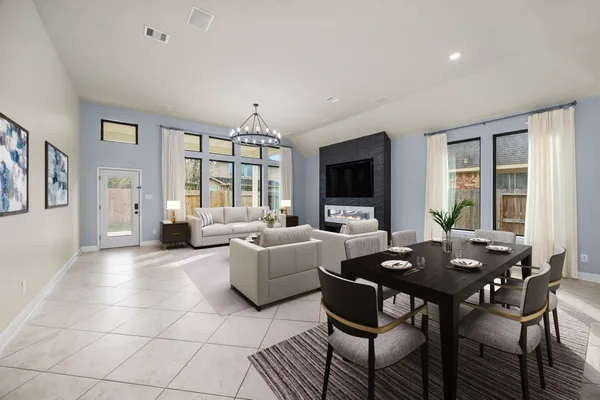 a view of a livingroom with furniture and a table