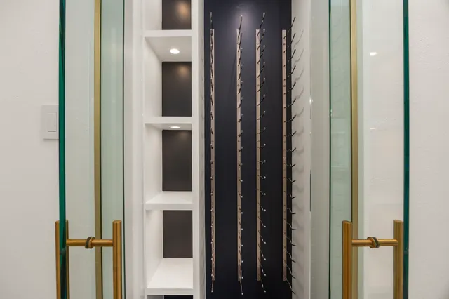 a view of a livingroom with furniture and a table