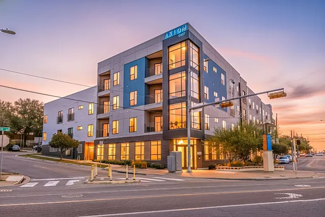 a view of a building and a street