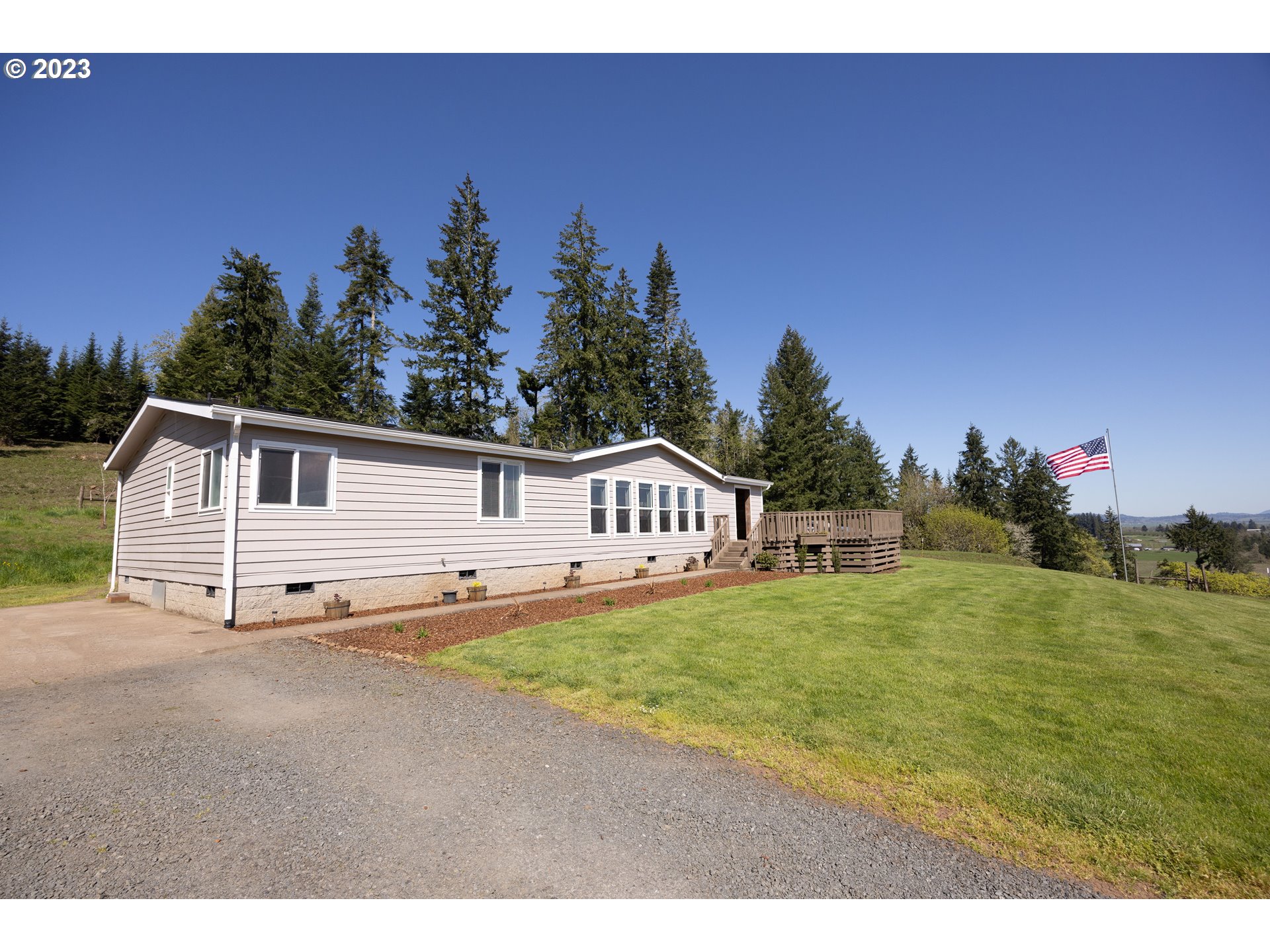 33125 Tate Road Creswell, OR 97426 - Photo 23 of 46 a front view of a house with a yard