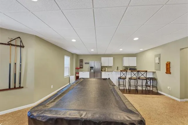 a view of a livingroom with furniture