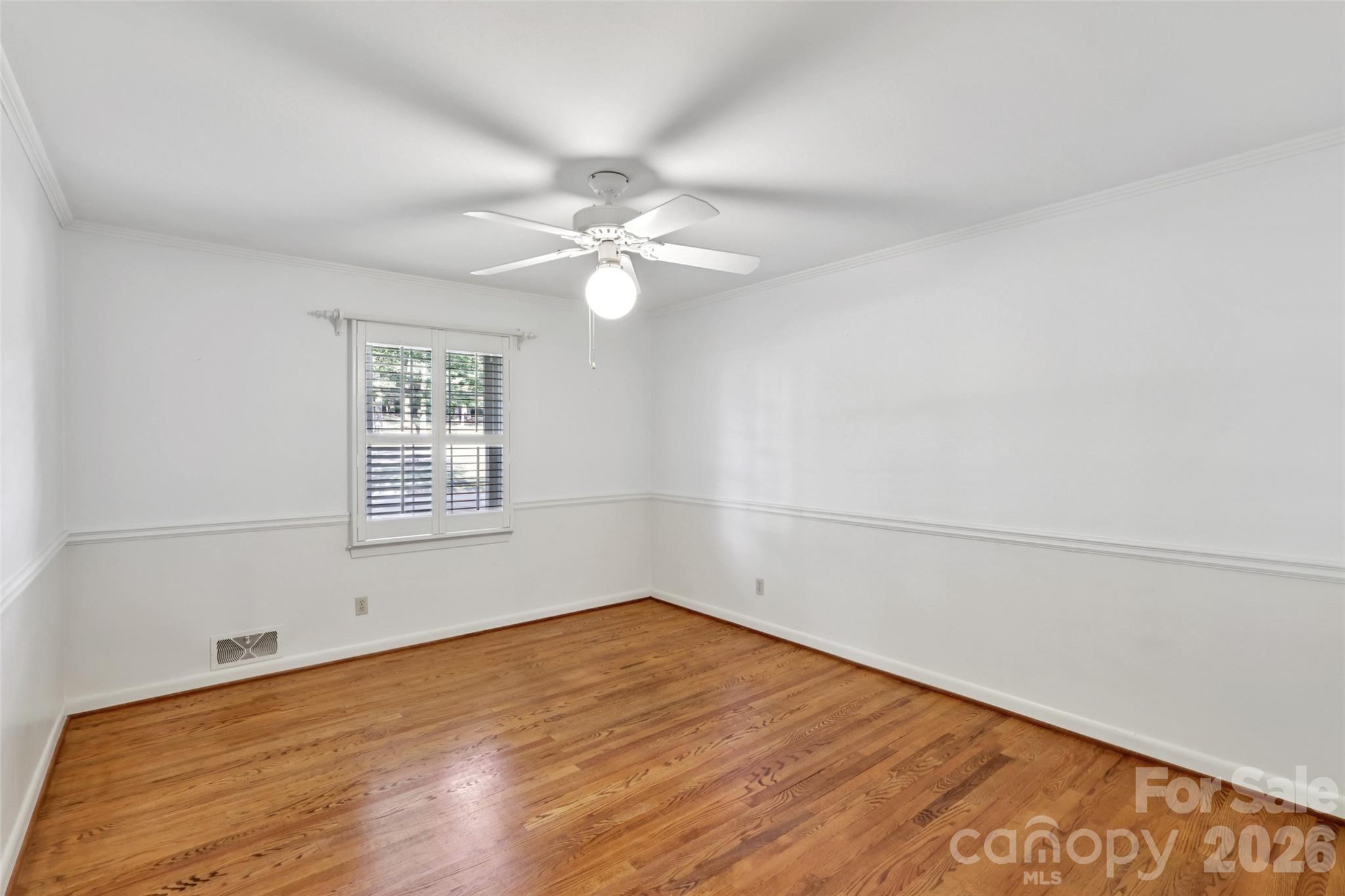 1002 Ridge Street Albemarle, NC 28001 - Photo 25 of 45 an empty room with a window