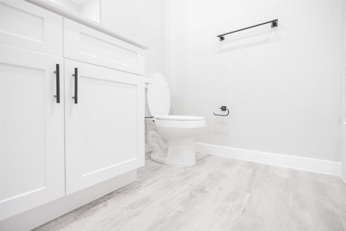2101 Reinke Road, Unit 8310 Waller, TX 77484 - Photo 21 of 33 a white toilet sitting next to a shower