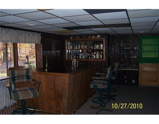 Family Room. The finished basement has a full bath, room with a bar & seperate huge family room with a stone fireplace