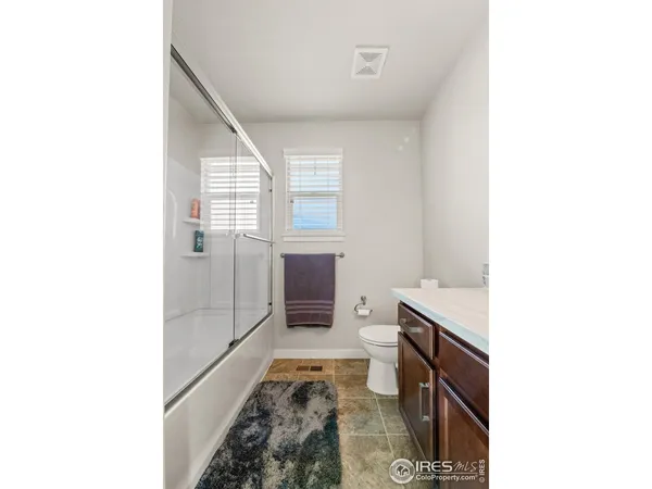a en suite bathroom with a sink and a toilet