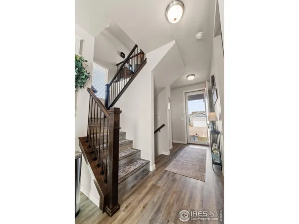 a view of a hallway with staircase