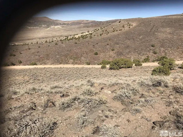 a view of mountain view with mountains in the background