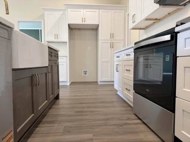 a view of a kitchen from the hallway
