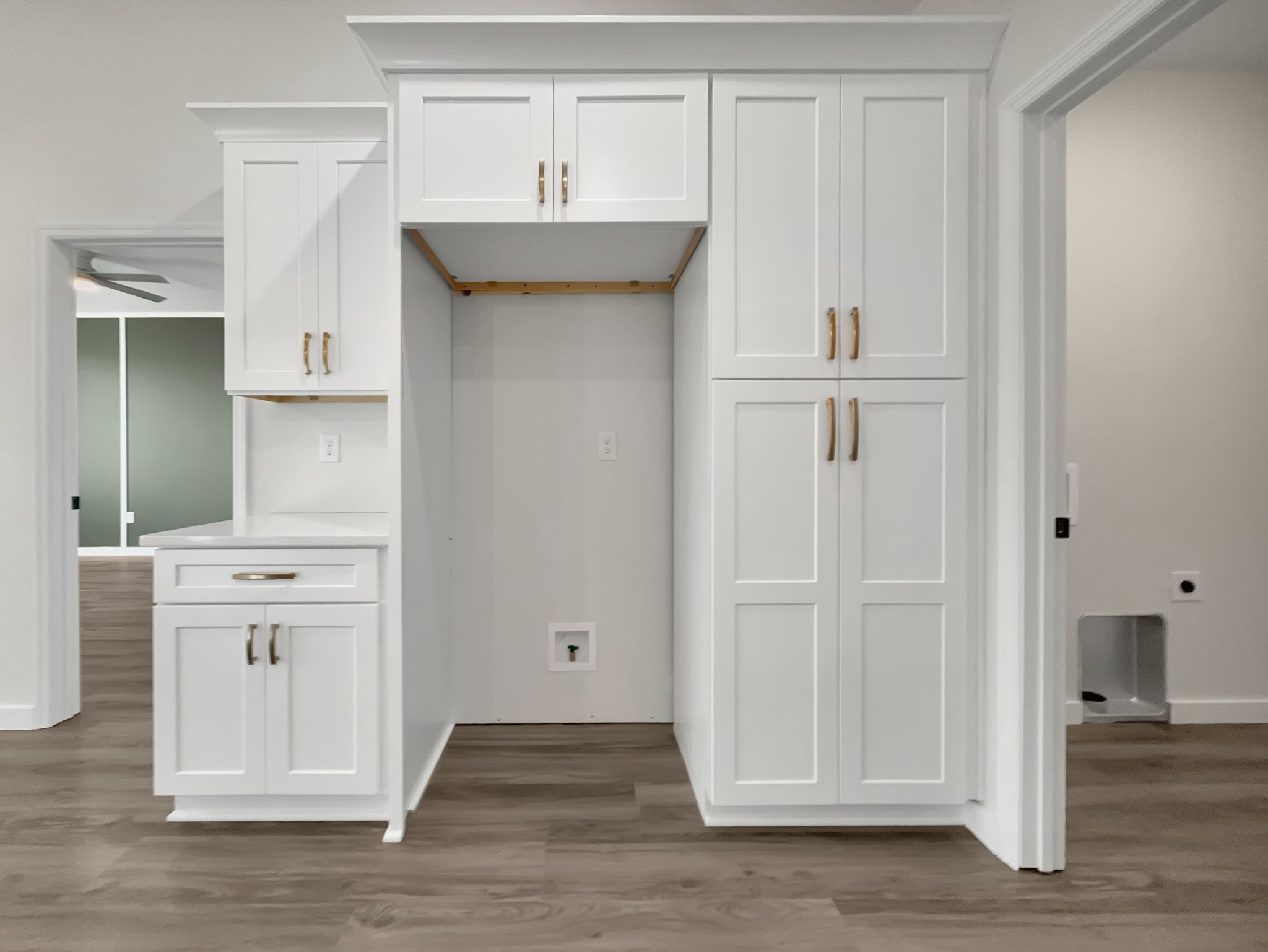 41 Sunny View Drive Carthage, TN 37030 - Photo 12 of 34 an empty room with wooden floor and cabinet