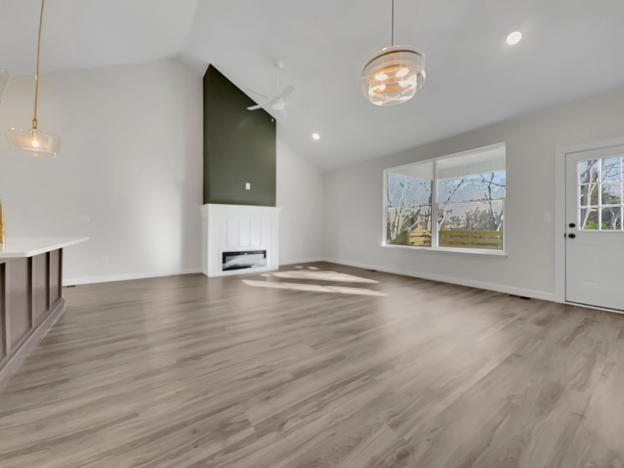41 Sunny View Drive Carthage, TN 37030 - Photo 14 of 34 a view of an empty room with window and wooden floor