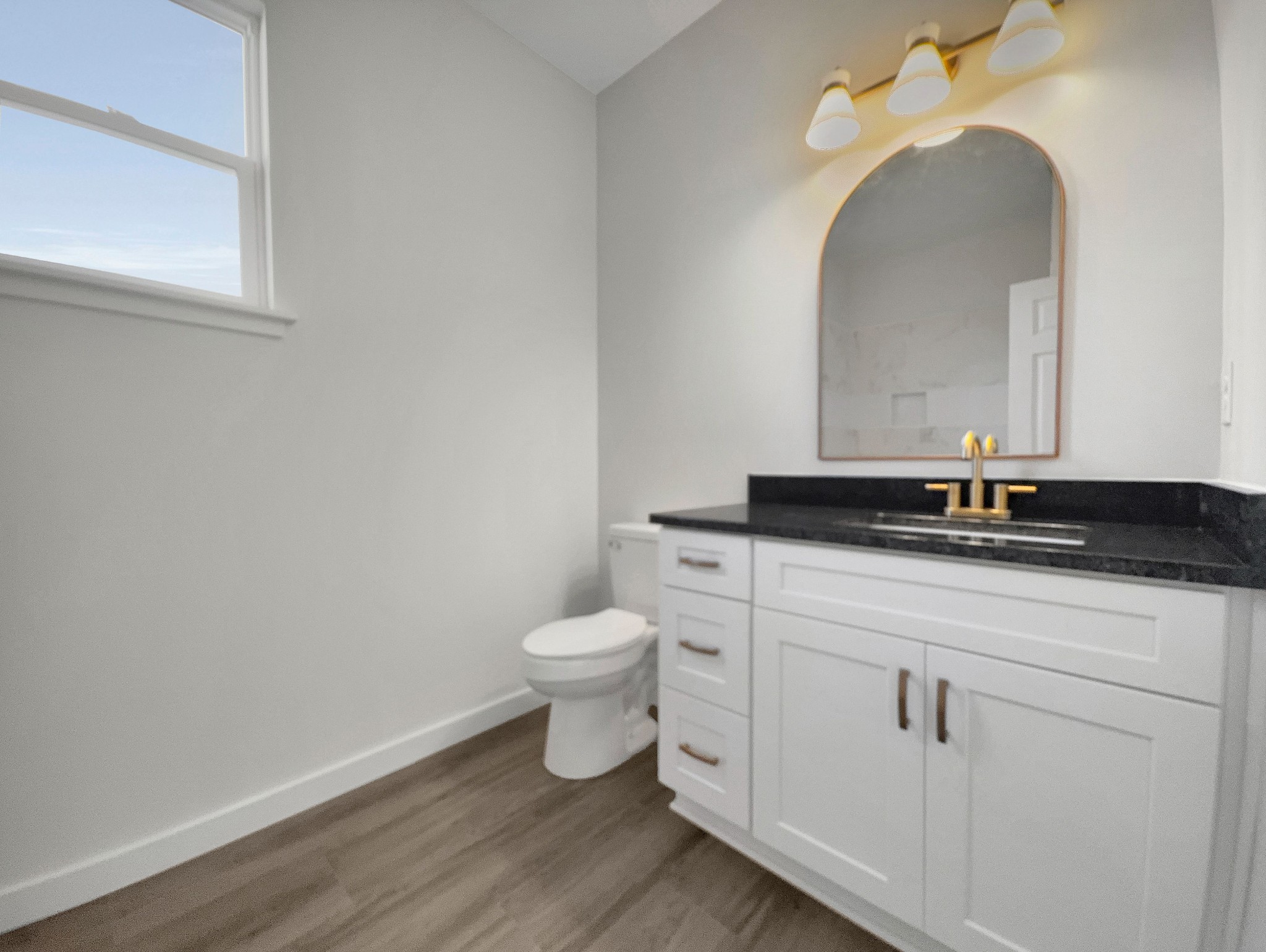 41 Sunny View Drive Carthage, TN 37030 - Photo 29 of 34 a bathroom with a granite countertop toilet and a sink