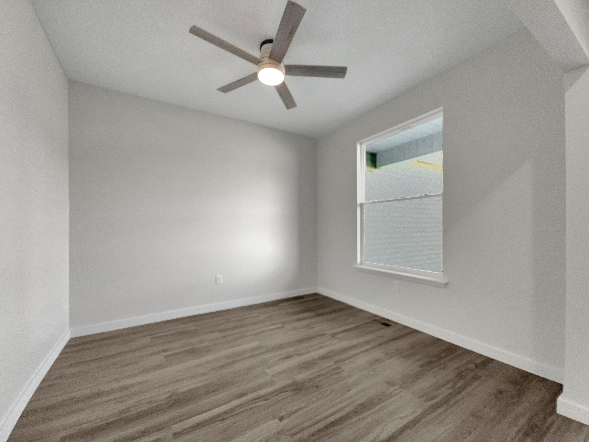 41 Sunny View Drive Carthage, TN 37030 - Photo 5 of 34 wooden floor in an empty room with a window