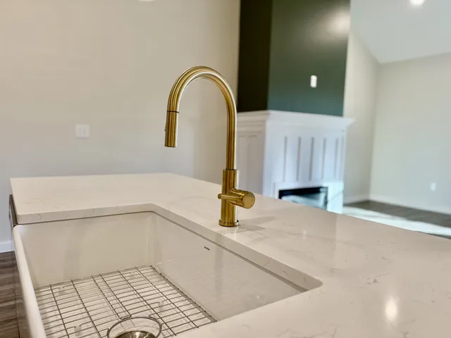a view of a kitchen with a sink