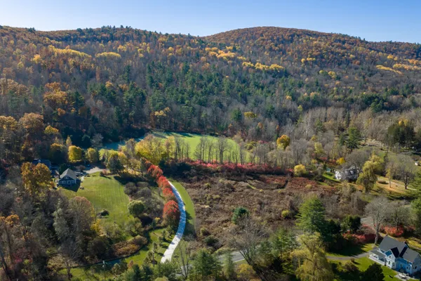 a view of a houses with a yard