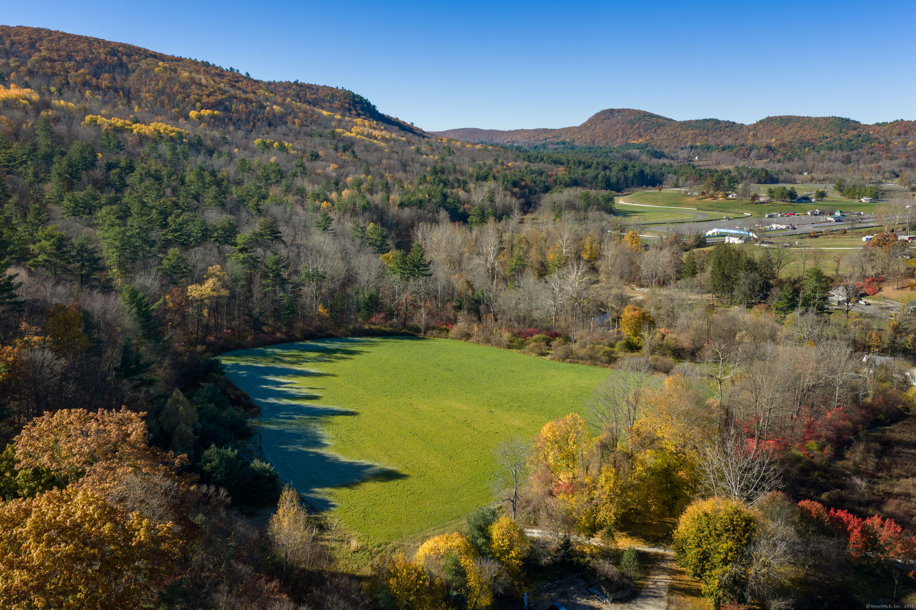 0 Lime Rock Road Lakeville, CT 06039 - Photo 3 of 27 a view of lake with mountain