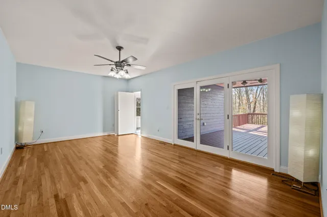 a bedroom with a bed and cabinets