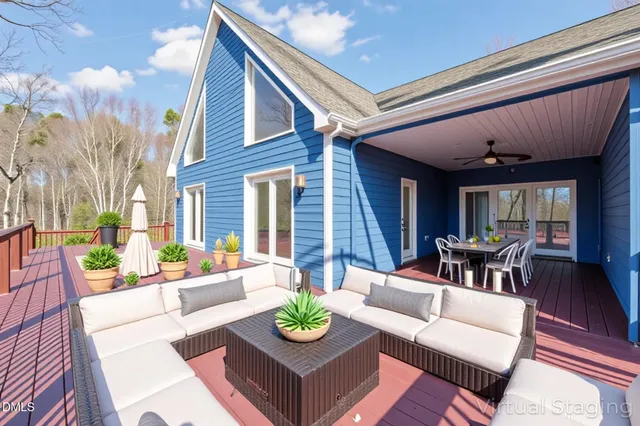 an aerial view of a houses with a yard