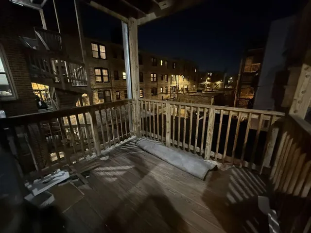 a kitchen with a refrigerator and a window