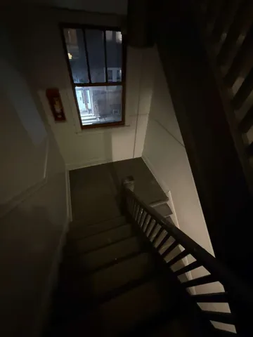 a view of hallway with stairs