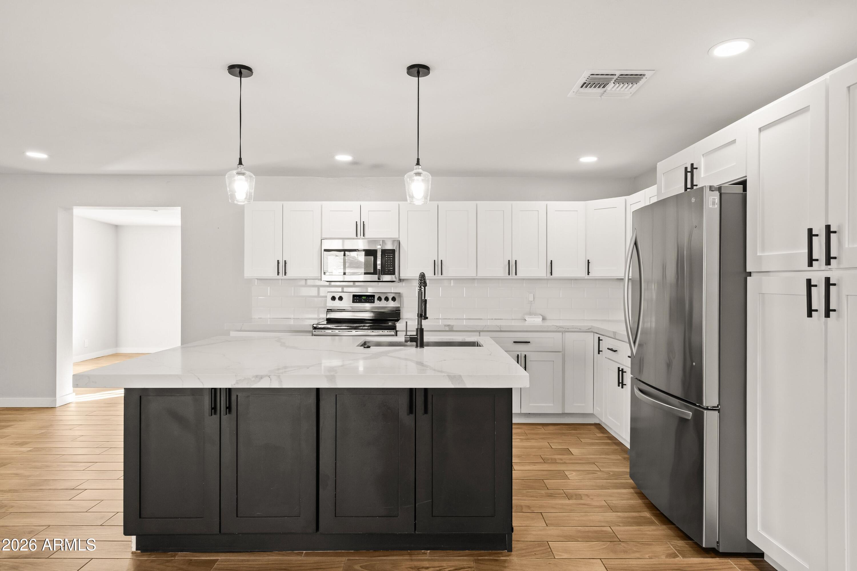 1715 South Roberts Road Tempe, AZ 85281 - Photo 7 of 24 007_Kitchen to Dining Room