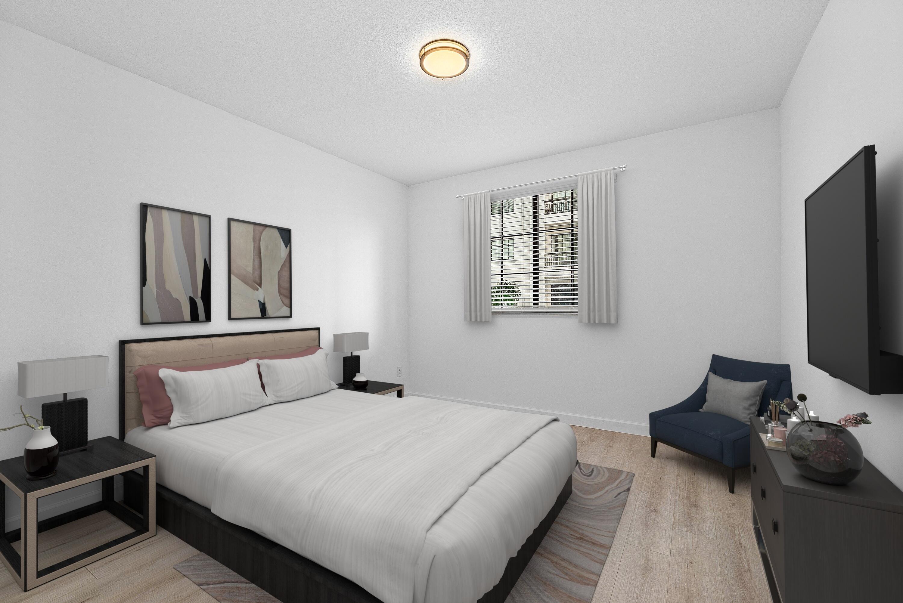 233 South Federal Highway, Unit 404 Boca Raton, FL 33432 - Photo 17 of 34 a bedroom with a bed and a flat tv screen on the dresser